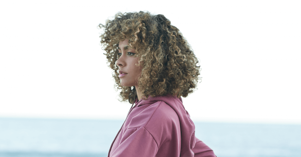 6. The Dos and Don'ts of Maintaining Curly Hair with Blonde Streaks - wide 9